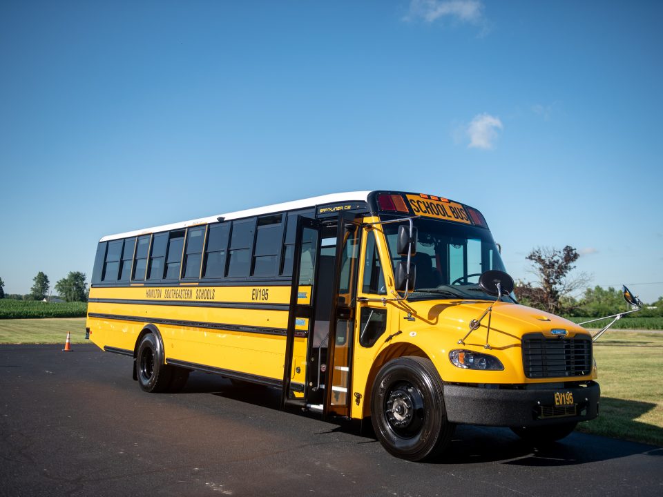 Electric school bus side